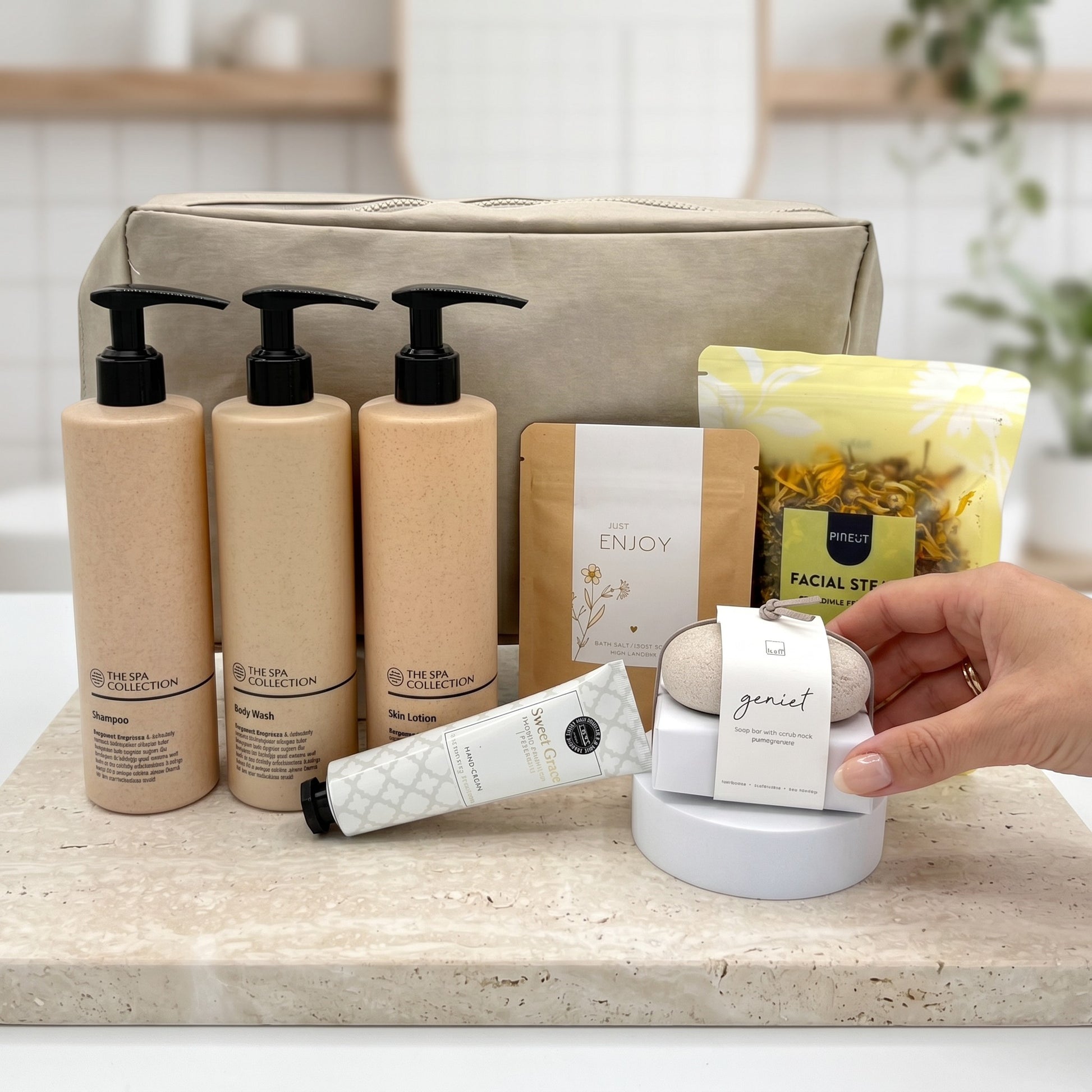 Cosmetic set with skincare products and a pouch on a wooden surface.