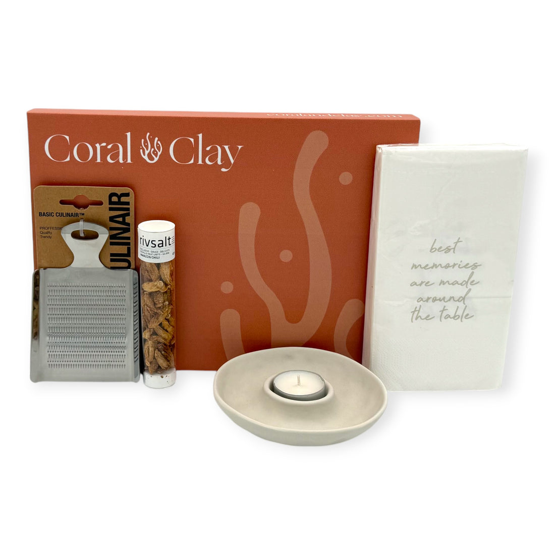 Coral & Clay Candlelight Dinner Letterbox Gift with Rivsalt Amazon Chili, stainless-steel grater, ceramic tealight holder, dinner napkins, and coral-coloured gift box.