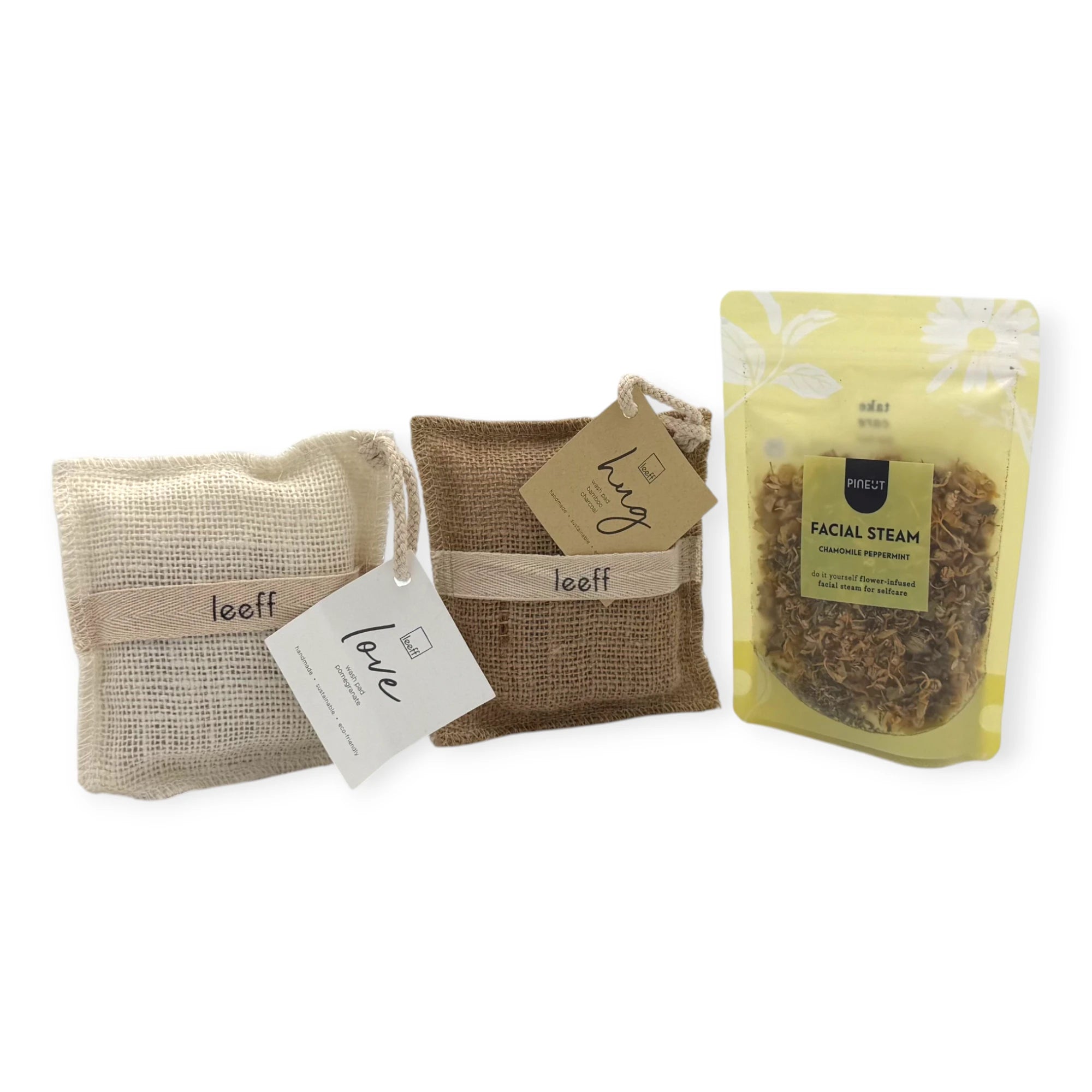 Contents of the Coral & Clay Calm Moments Letterbox Gift featuring Leeff scented sachets and Pineut chamomile peppermint facial steam.