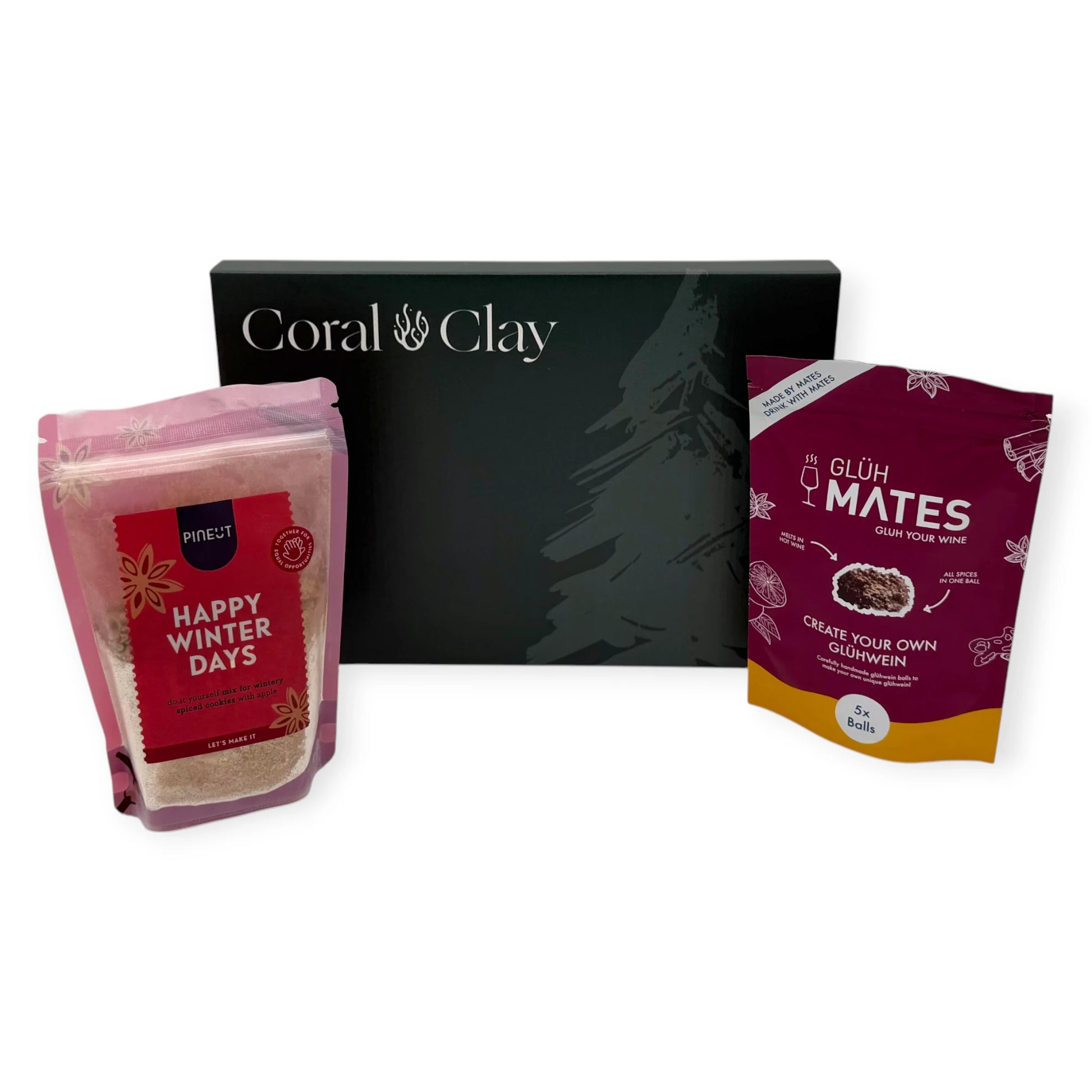 Coral & Clay Winter Warmth Christmas Letterbox Gift displayed with Glüh Mates glühwein mix and Pineut Happy Winter Days cookie mix.