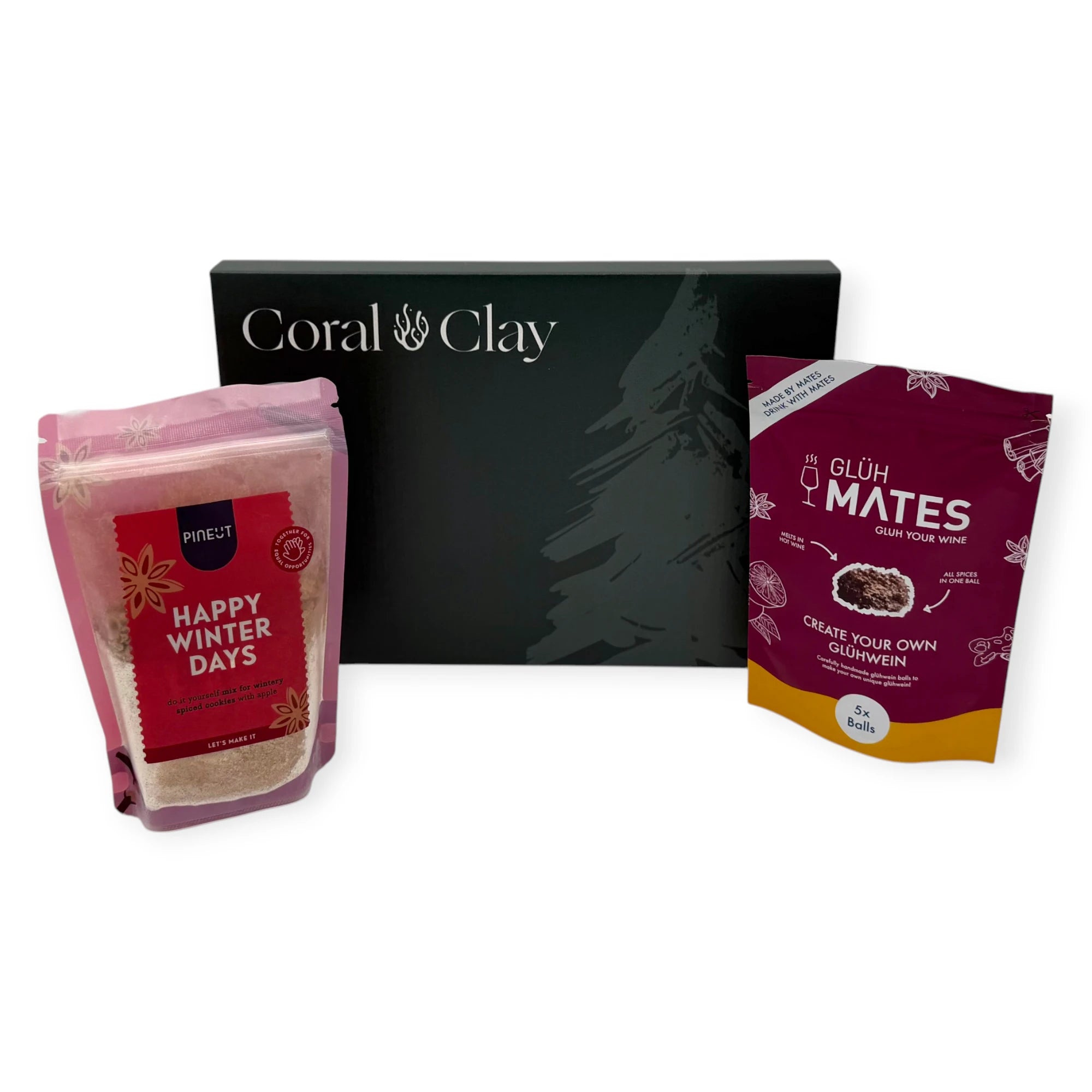 Coral & Clay Winter Warmth Christmas Letterbox Gift displayed with Glüh Mates glühwein mix and Pineut Happy Winter Days cookie mix.
