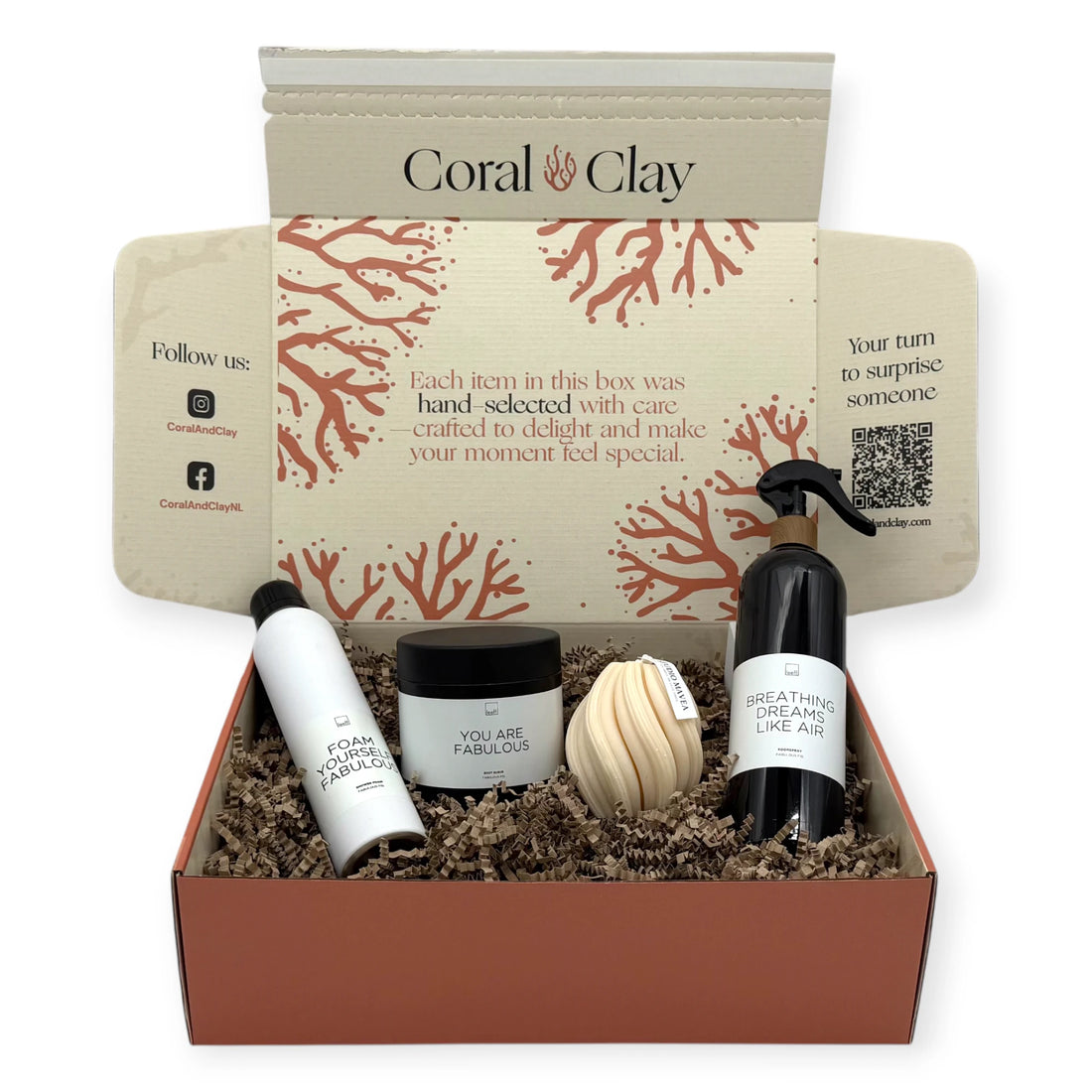 Feel-Good Signature Gift with Leeff body scrub, shower foam, room spray, and Studio Amava body sponge arranged in a Coral & Clay Signature box.