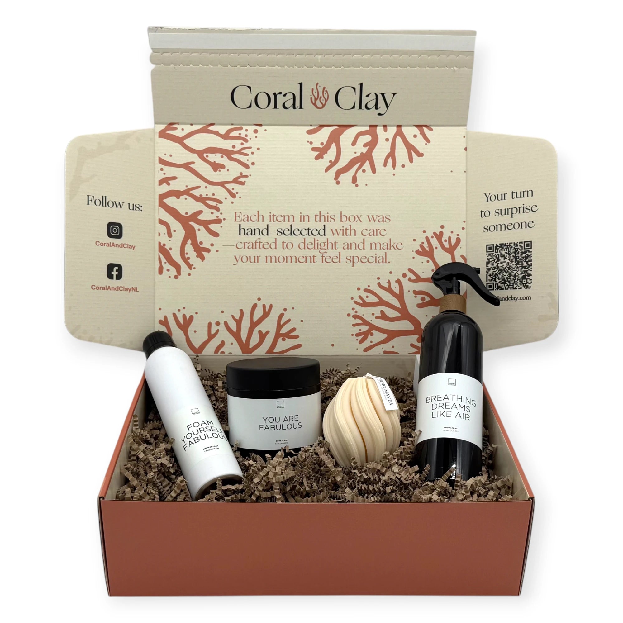 Top-down view of the Feel-Good Signature Gift — Leeff self-care products and Studio Amava sponge displayed in a Coral & Clay Signature box.