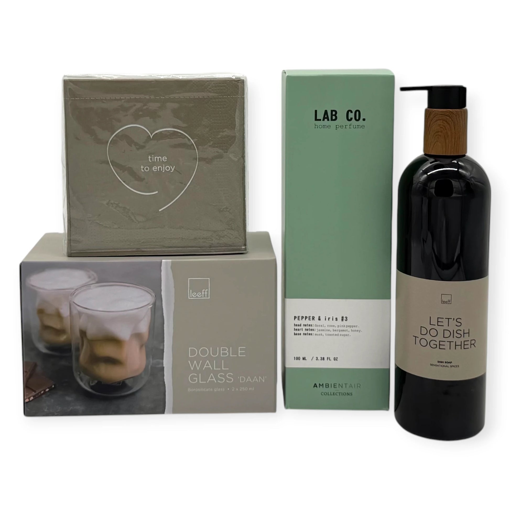 Home Haven Signature Gift contents arranged together, including Leeff ‘Time to Enjoy’ napkins, Leeff double-wall glasses, LAB CO. Pepper & Iris home perfume, and Leeff ‘Let’s Do Dish Together’ dish soap.