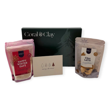 Coral & Clay Chai Christmas Letterbox Gift displayed with Pineut Chai Latte mix, Happy Winter Days cookie mix, and a minimalist Christmas card.